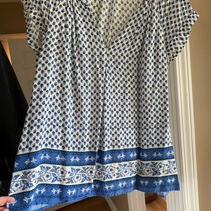 Light, airy blue and white top